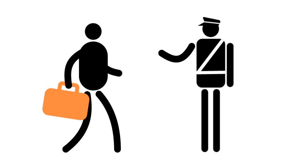 A customs officer stopping passenger for inspection